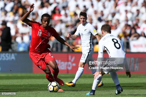 Andre Carrillo of Peru is challenged by Michael McGlinchey of New Zealand during the 2018 FIFA World Cup Qualifier match between the New Zealand All...