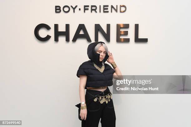 Singer Billie Eilish, wearing CHANEL, attends as CHANEL celebrates the launch of the Coco Club, a Boy-Friend Watch event at The Wing Soho on November...