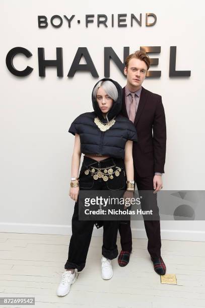 Singer Billie Eilish, wearing CHANEL, and musician Finneas O'Connell attend as CHANEL celebrates the launch of the Coco Club, a Boy-Friend Watch...
