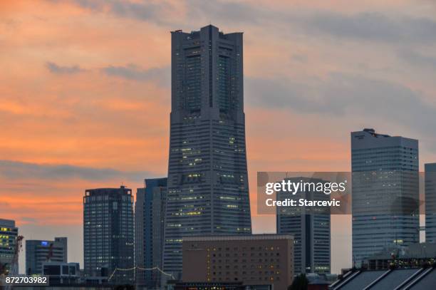 yokohama - minato mirai skyline during beautiful sunset - yokohama skyline stock pictures, royalty-free photos & images