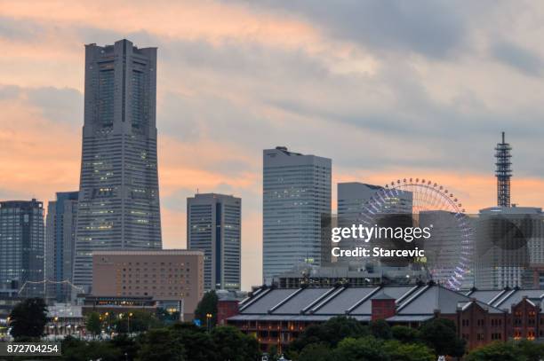 yokohama - minato mirai skyline during beautiful sunset - yokohama skyline stock pictures, royalty-free photos & images