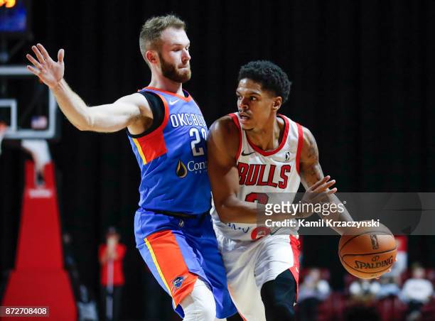 Jarell Eddie of the Windy City Bulls looks to pass the ball against Bryce Alford of the Oklahoma City Blue during the second half of an NBA G-League...
