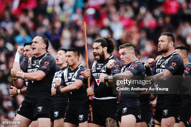 Adam Blair of the Kiwis leads the haka against Tonga during the 2017 Rugby League World Cup match between the New Zealand Kiwis and Tonga at Waikato...