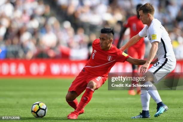 Christian Cueva of Peru controls the ball from Michael McGlinchey of the All Whites during the 2018 FIFA World Cup Qualifier match between the New...