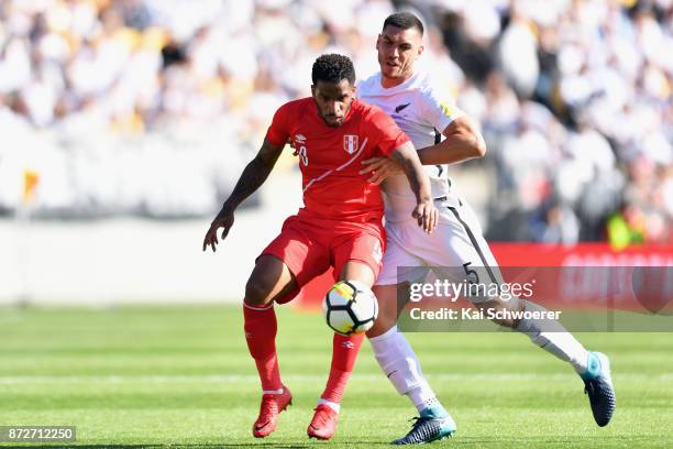 Jefferson Farfan of Peru controls the ball from Michael Boxall of the All Whites during the 2018 FIFA World Cup Qualifier match between the New...