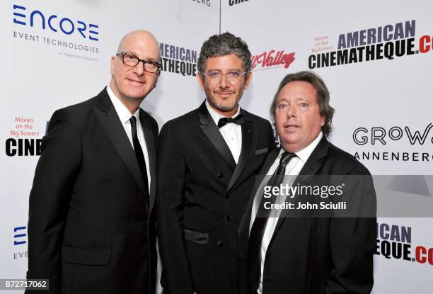 Honoree Greg Foster of IMAX, Eric Nebot, and honoree Richard Gelfond of IMAX attend the 31st American Cinematheque Award Presentation Honoring Amy...