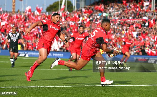 David Fusitua of Tonga scores a try during the 2017 Rugby League World Cup match between the New Zealand Kiwis and Tonga at Waikato Stadium on...