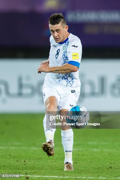 Server Djeparov of Uzbekistan in action during their 2018 FIFA World Cup Russia Final Qualification Round Group A match between China PR and...