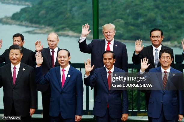 China's President Xi Jinping, Vietnam's President Tran Dai Quang, Indonesia's President Joko Widodo, Japan's Prime Minister Shinzo Abe, Philippine...