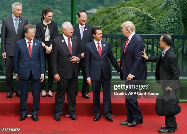President Donald Trump joins South Korea's President Moon Jae-in, Malaysia's Prime Minister Najib Razak, Mexico's President Enrique Pena Nieto,...