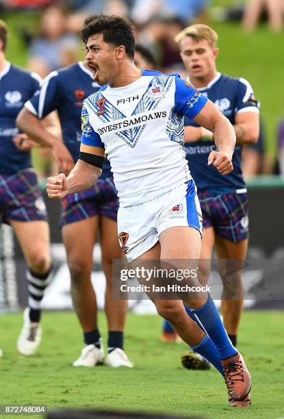 Young Tonumaipea of Samoa scores a try during the 2017 Rugby League World Cup match between Samoa and Scotland at Barlow Park on November 11, 2017 in...