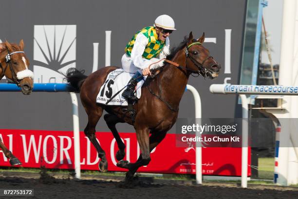 Jockey Olivier Peslier riding Rabbah De Carrere wins the Dubai Kahayla Classic during the Dubai World Cup race day at the Meydan racecourse on March...