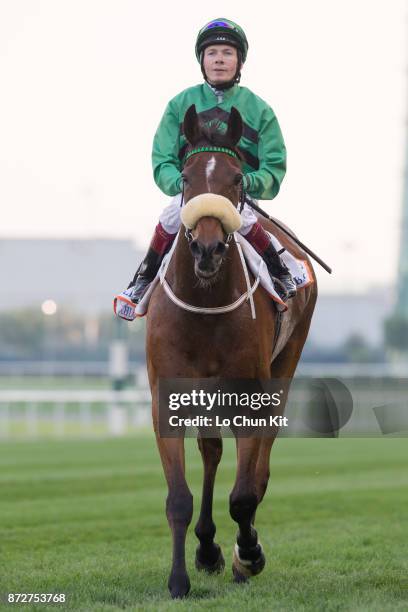 Jockey Jamie Spencer riding Certerach wins the Dubai Gold Cup during the Dubai World Cup race day at the Meydan racecourse on March 29, 2014 in...