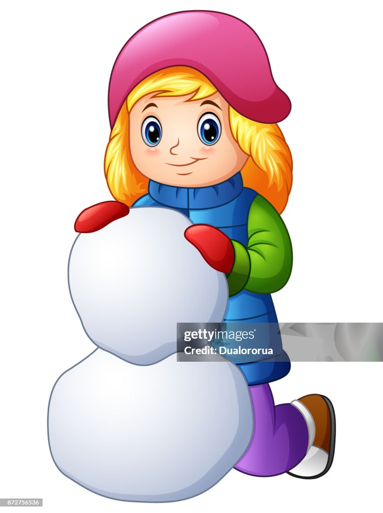 Menina dos desenhos animados em roupas de inverno, fazendo a bola de neve