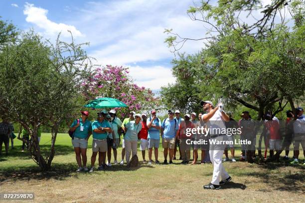 Victor Dubuisson of France hits his second shot on the 1st hole during the third round of the Nedbank Golf Challenge at Gary Player CC on November...