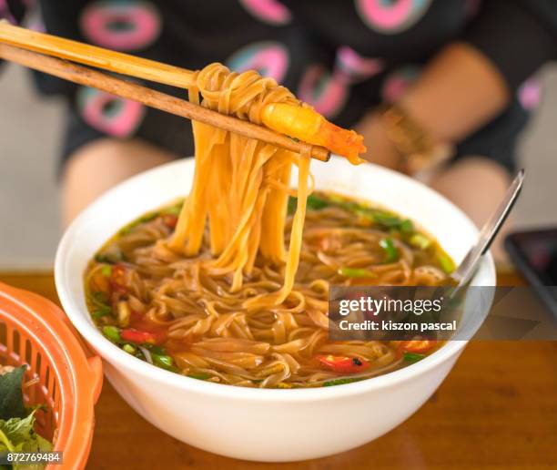 pho noodle soup , vietnamese traditional food , street food - vietnam market stock pictures, royalty-free photos & images