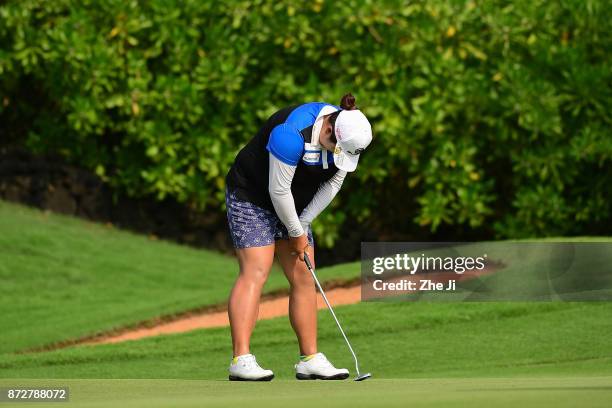 Shanshan Feng of China plays a shot on the 16th hole during the final round of the Blue Bay LPGA at Jian Lake Blue Bay golf course on November 11,...