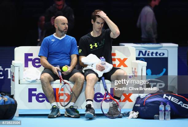 Andy Murray of Great Britain with coach Jamie Delgado during a training session to test his fitness as he comes back from injury prior to the Nitto...