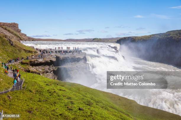 famous gullfoss waterfall in summertime, iceland - gullfoss falls stock-fotos und bilder