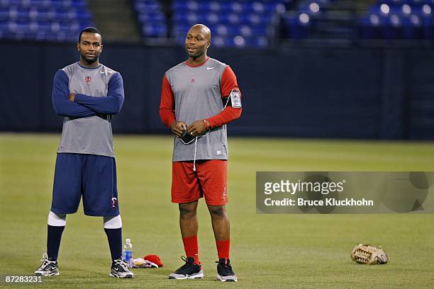 Torii Hunter of the Los Angeles Angels talks withDenard Span of the Minnesota Twins before the game on April 19, 2009 at the Metrodome in...