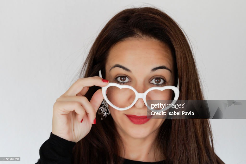Look Over Spectacles Woman Looking Over Glasses High-Res Stock Photo - Getty Images