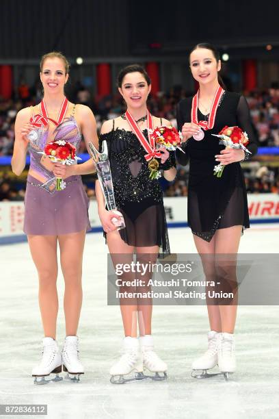 Carolina Kostner of Italy , Evgenia Medvedeva of Russia , Polina Tsurskaya of Russia pose with their medals during the ISU Grand Prix of Figure...