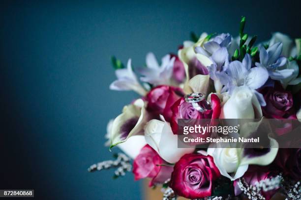 wdding bouquet with rings - ring around the rosy stock pictures, royalty-free photos & images