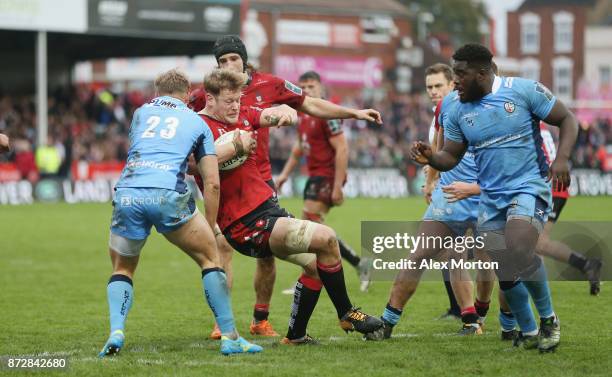 Tom Savage of Gloucester and Matt Williams of London Irish during the Anglo-Welsh Cup match between Gloucester Rugby and London Irish at Kingsholm...