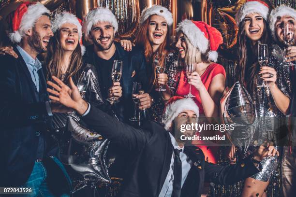 having an awesome time together - office party stock pictures, royalty-free photos & images