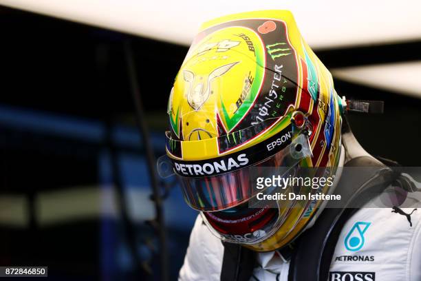 Lewis Hamilton of Great Britain and Mercedes GP prepares to drive in the garage during final practice for the Formula One Grand Prix of Brazil at...