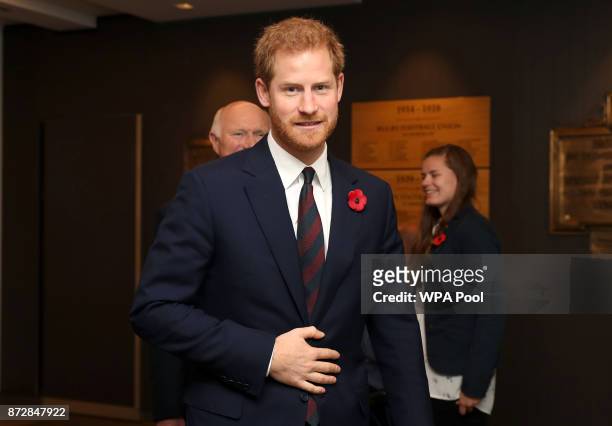 Prince Harry looks on ahead of the Rugby Union International match between England and Argentina at Twickenham Stadium on November 11, 2017 in...