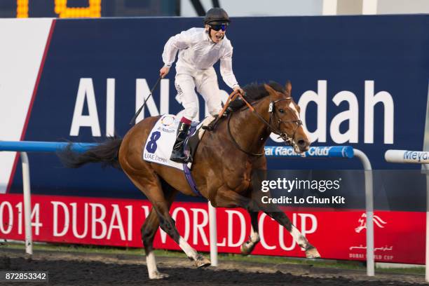 Jockey Jamie Spencer riding Toast Of New York wins the UAE Derby during the Dubai World Cup race day at the Meydan racecourse on March 29, 2014 in...