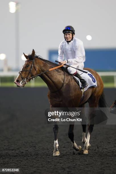 Jockey Jamie Spencer riding Toast Of New York wins the UAE Derby during the Dubai World Cup race day at the Meydan racecourse on March 29, 2014 in...