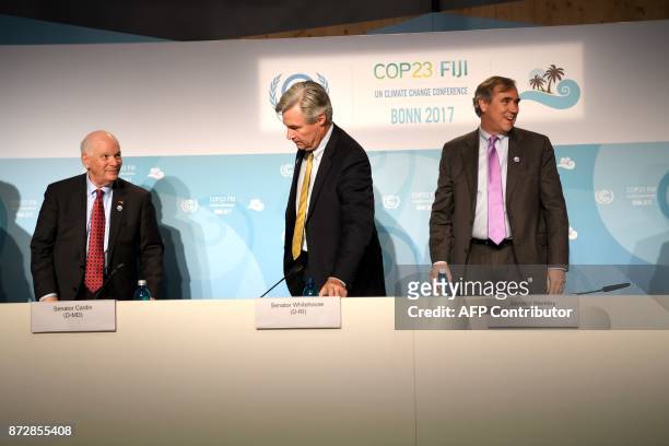 Senator Ben Cardin , Sheldon Whitehouse and Jeff Merkley of Oregon leave a press conference on November 11, 2017 during the COP23 United Nations...