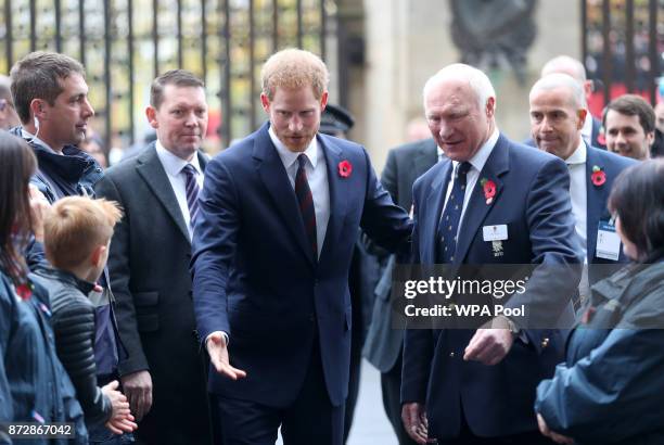 Prince Harry and RFU President John Spencer arrive ahead of the Rugby Union International match between England and Argentina at Twickenham Stadium...