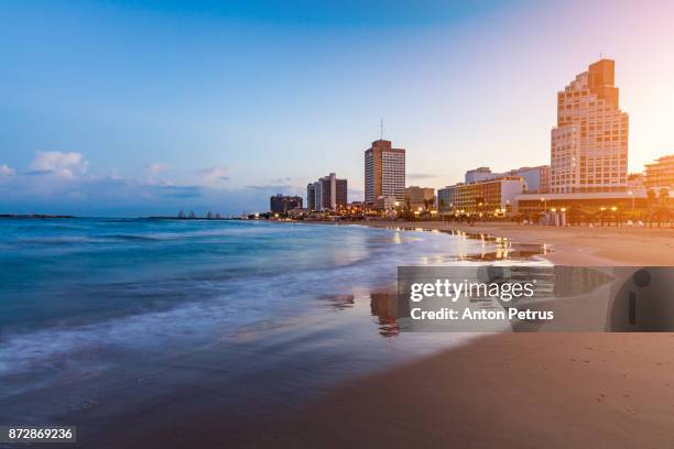 panoramic view of tel-aviv beach (mediterranean sea, israel) - tel aviv stock-fotos und bilder