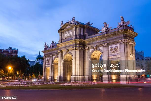 spanish cities - puerta de alcala in madrid, spain - madrid fotografías e imágenes de stock