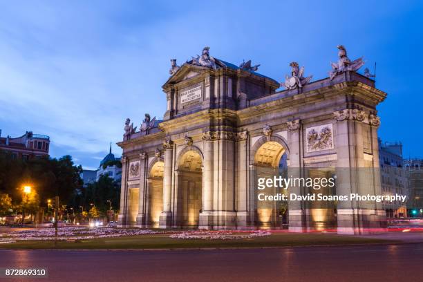 spanish cities - puerta de alcala in madrid, spain - madrid stock pictures, royalty-free photos & images