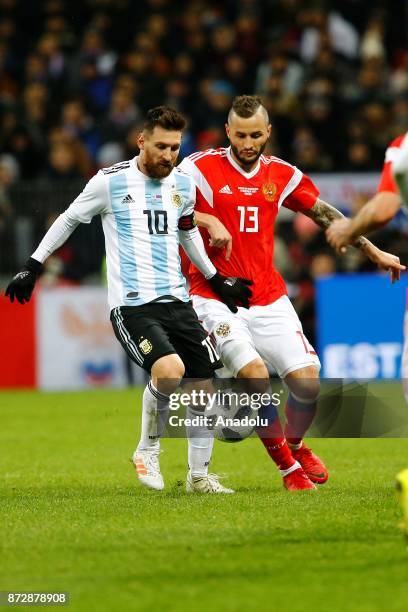 Lionel Messi of Argentina in action against Fedor Kudryashov of Russia during the international friendly match between Russia and Argentina at BSA OC...