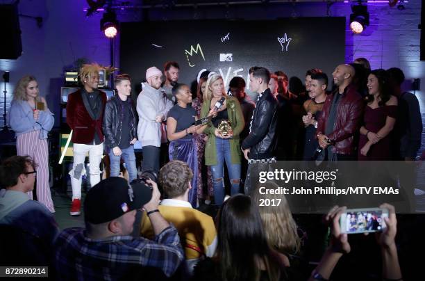 Tinea Taylor presents Mike Tompkins and Andie Case with their Cover of The Year Award during the MTV EMAs 2017 Breaks Sessions on November 11, 2017...