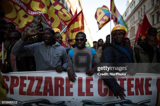 Protesters take part in an Euro-Stop demonstration to protest against European Union, italian policies and Eurozone in downtown Rome on November 11,...