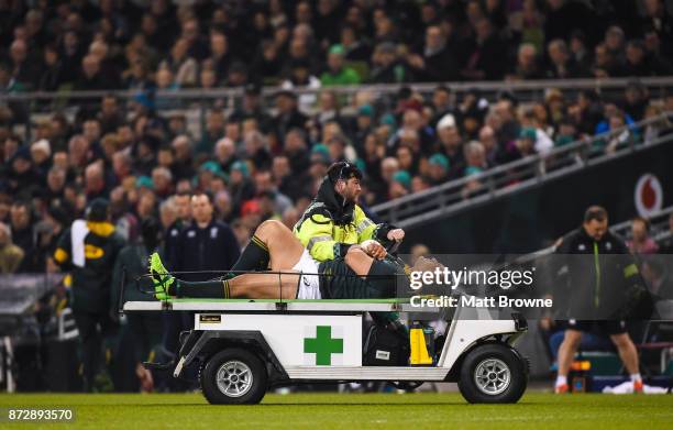 Dublin , Ireland - 11 November 2017; 11 November 2017; Coenie Oosthuizen of South Africa is is stretchered from the field after an injury during the...