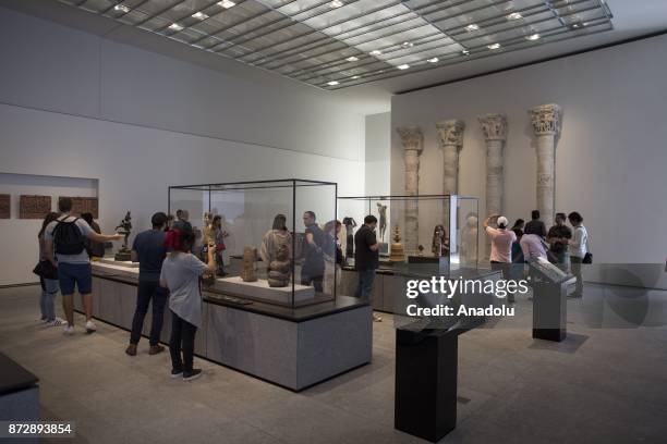 People visit the Louvre Abu Dhabi displaying 600 art pieces including 300 artworks rented from the Louvre, in Abu Dhabi, UAE on November 11, 2017.