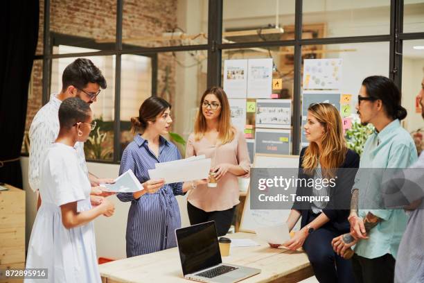 team work, meeting in a table. new strategies. - hipster stock pictures, royalty-free photos & images