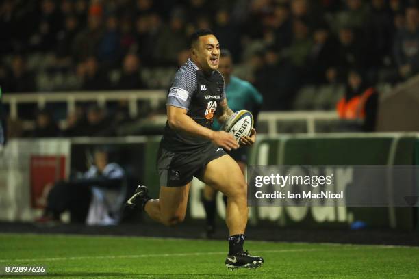 Sinoti Sinoti of Newcastle Falcons runs through to score the second try of the game during the Anglo-Welsh Cup match between Newcastle Falcons and...