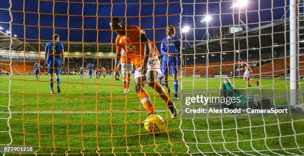 Blackpool's Nathan Delfouneso gathers the ball after Portsmouth's Oliver Hawkins scored an own goal to make the score 2-2 during the Sky Bet League...
