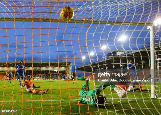 Portsmouth's Luke McGee can't keep out Blackpool's Viv Solomon-Otabor's shot which made the score 1-1 during the Sky Bet League One match between...
