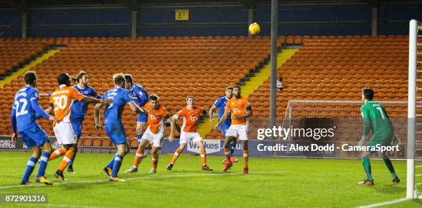 Portsmouth's Oliver Hawkins scores an own goal to make the score 2-2 during the Sky Bet League One match between Blackpool and Wigan Athletic at...