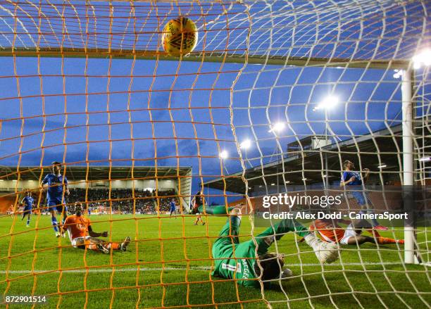 Portsmouth's Luke McGee can't keep out Blackpool's Viv Solomon-Otabor's shot which made the score 1-1 during the Sky Bet League One match between...