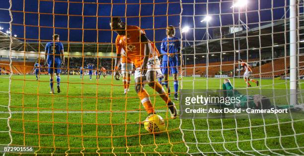 Blackpool's Nathan Delfouneso gathers the ball after Portsmouth's Oliver Hawkins scored an own goal to make the score 2-2 during the Sky Bet League...